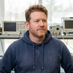 David Surovik in a headshot portrait